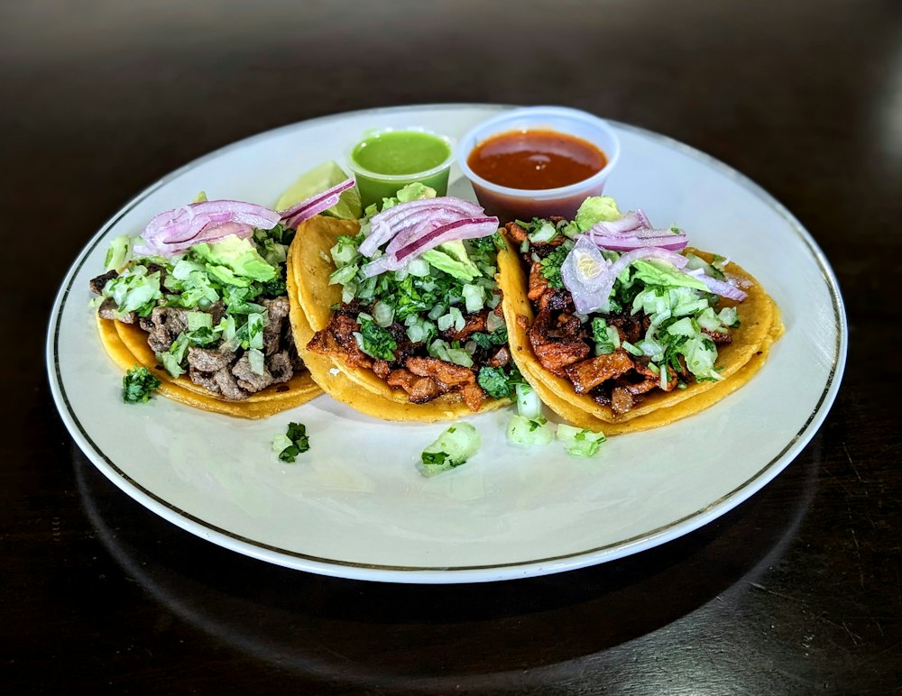 Stock photo of street tacos with salsas